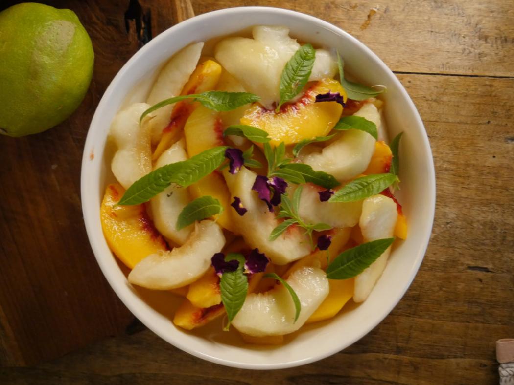 Peach salad with mint and flowers