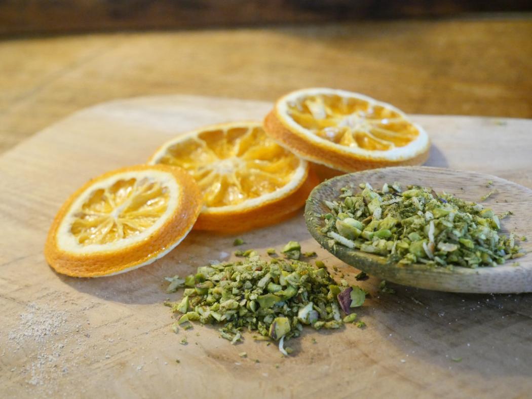 Dried orange slices and herbs
